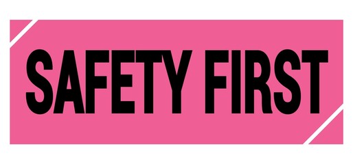 SAFETY FIRST text on pink-black grungy stamp sign.