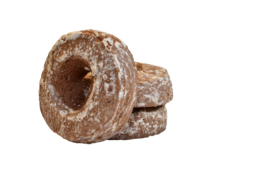 Several round gingerbread cookies isolated on a PNG background.