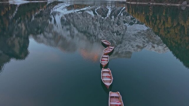 Aerial capture of colorful Lago di Braies landscape, Northern Italy