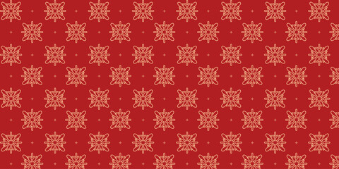 Elegant seamless pattern with golden snowflakes and tiny stars on a rich red background, perfect for Christmas wrapping paper, festive textiles, greeting cards, invitations and seasonal holiday design