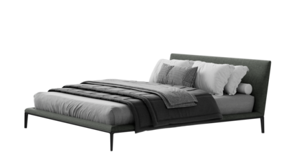 Contemporary double bed with comforter and pillows on an isolated background. 