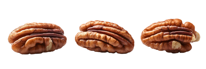 Four whole walnuts against transparent background