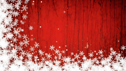 A festive Christmas background with a frosty border of white snowflakes on a rustic red wood texture.