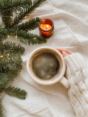 Cup of coffee, candle and Cheristmas tree