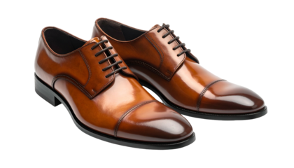 Gleaming brown leather cap-toe dress shoes, laced, against black