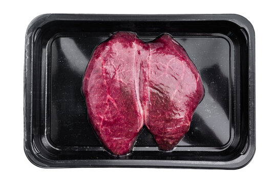 Raw Wagyu chuck steak with rich marbling packaged in a black tray on white background perfect for premium butcher and gourmet food stock images.