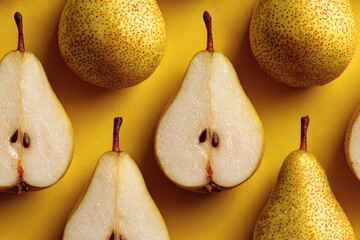 Ripe yellow pears with pear half on bright yellow background, minimal food concept