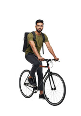 Obraz premium young handsome indian man (28) in glasses and olive t-shirt, sitting confidently on a matte black commuter bicycle against a transparent studio cyc wall. concept of sustainable urban lifestyle