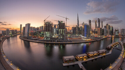 Dubai city center at sunset near river aerial timelapse