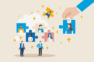 Hand assembling a team puzzle with diverse people portraits and business people below