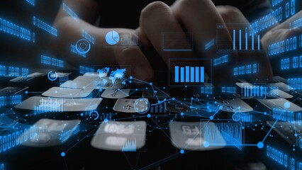 Close-up view of hands typing on a keyboard with digital data graphics and analytics displayed, reflecting the intersection of technology and modern digital communication. Xenic
