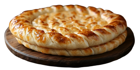 Golden baked flatbread with melted cheese on wooden plate