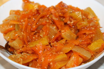 Delicious vegetable dish with carrots, bell peppers, and spices cooked to perfection for a vibrant meal