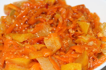 Delicious vegetable stir-fry with carrots, bell peppers, and onions for a healthy meal