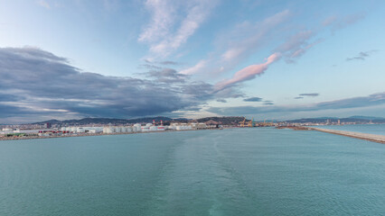 Aerial view of sea with waves and port from ship sailing in the open sea timelapse