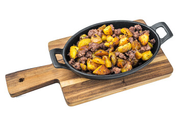 lassic beef hash with golden diced potatoes in a black cast iron pan on bright background ideal for hearty meal imagery.