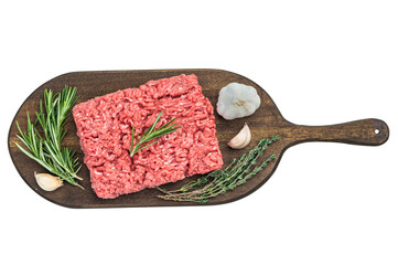 Fresh raw groundmeat with rosemary and thyme on dark wooden board against white background ideal for cooking, butcher and protein themes.