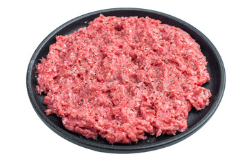 Uncooked minced beef and pork meat seasoned lightly on round plate highlighting raw texture for culinary, butcher and food preparation visuals.