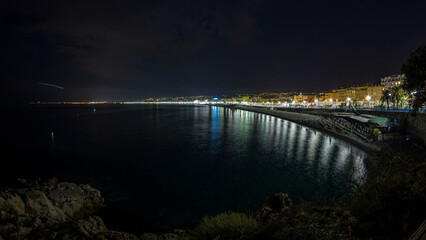 Waterfront of Nice city and Mediterranean Sea day to night timelapse