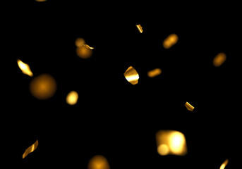 キラキラと舞い落ちるメタリックなコンフェッティの背景素材　金色の紙吹雪