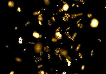 キラキラと舞い落ちるメタリックなコンフェッティの背景素材　金色の紙吹雪