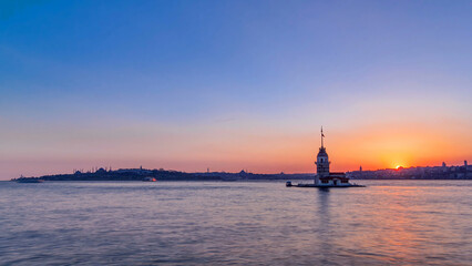 Fototapeta premium Maidens tower before sunset timelapse in istanbul, turkey, kiz kulesi tower