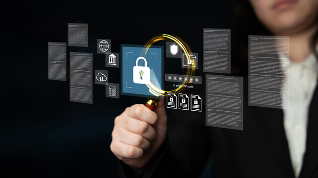 A professional explores cybersecurity elements, emphasizing digital locks and the vital role of data protection in technology. This image represents vigilance in safeguarding information. Gantry