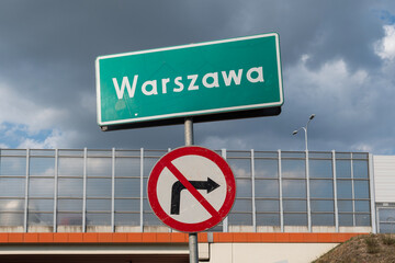 Warsaw road sign with no right turn symbol