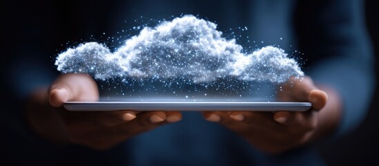 Cloud of light above tablet in hands