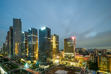 Naklejka premium Night view of the Pazhou West District CBD architectural complex in Guangzhou, China