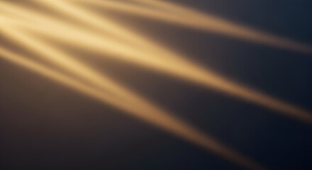 Golden light beams piercing through darkness, creating a warm and ethereal glow