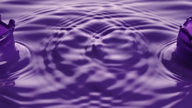Purple Water Ripple Dance: Mesmerizing interplay of light and shadow on the surface, showcasing the dance of ripples and droplets in shades of regal purple.