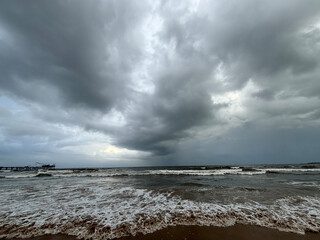 Dark Ocean Waves Under Monsoon Skies in Mumbai