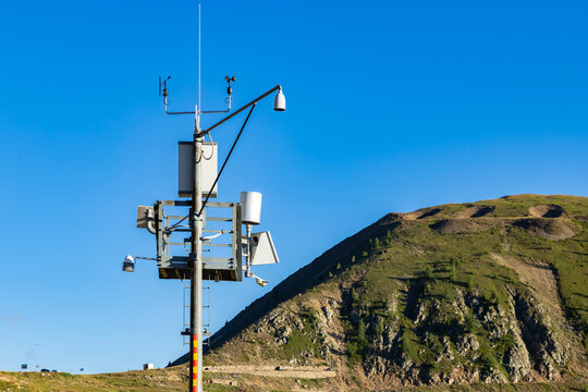 Weather station collecting environmental data in Italian Alps