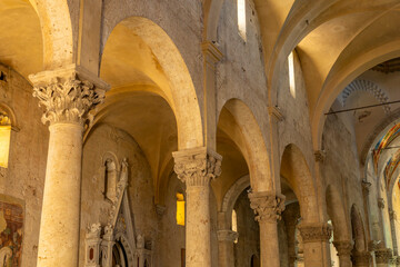 Fototapeta premium Church interior with ancient arches and stone columns in Massa Marittima