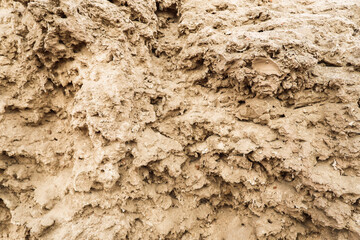Texture of yellow brown mountain range stone.