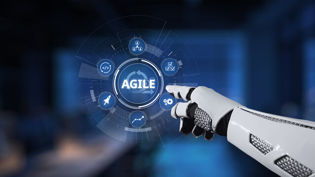 This image features a robotic hand pointing at an interactive digital interface displaying the word "Agile" alongside various icons, symbolizing innovation. Synapse - Powered by Adobe