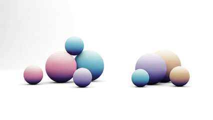 Two clusters of gradientcolored spheres a large group on the left and a smaller one on the right sit on a white surface