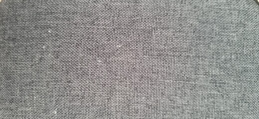 Abstract Gray and Red Textured Fabric Background with Subtle Weave Pattern.