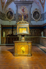Obraz premium Ornate lectern with choir book in Monte Oliveto Maggiore abbey, Tuscany