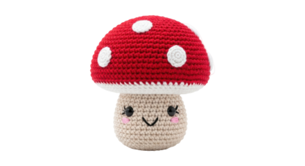 Adorable red and white mushroom amigurumi PNG isolated on transparent background, cute crochet toy for kids and whimsical decor