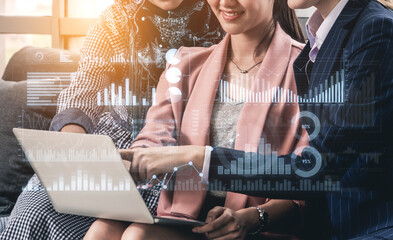 A diverse group of professionals engages in a digital analytics project, discussing data visualizations on a laptop in a modern office setting, promoting collaboration and innovation. Scalp