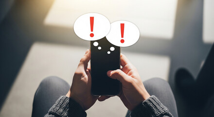 Person holding smartphone with urgent notification alerts, anxiety about digital communication.