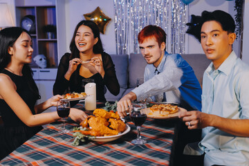 Diversity, dinner and group of people toast celebration together at party. Friends, happy and celebrate with food, wine and friendship for love, support and cheers champagne at business function