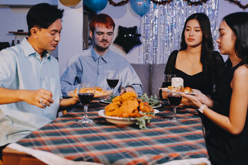 Diversity, dinner and group of people toast celebration together at party. Friends, happy and celebrate with food, wine and friendship for love, support and cheers champagne at business function