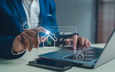 business professional comparing mortgage interest and property options through digital real estate icons, illustrating online financial planning, loan evaluation, and modern investment decisions.