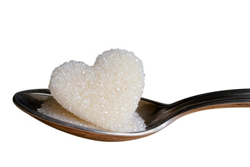 heart shaped sugar on a spoon, black background