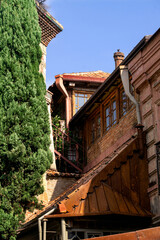 The Leaning Clock Tower is one of the most interesting landmarks of the Tbilisi Marionette Theater in central Tbilisi, Georgia, 2025.