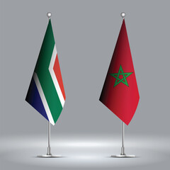 Two Standing Flags Representing Morocco vs South Africa with Flags on Bodies 