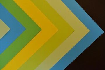 Abstract chevron pattern with blue green and yellow colorful geometric design modern background